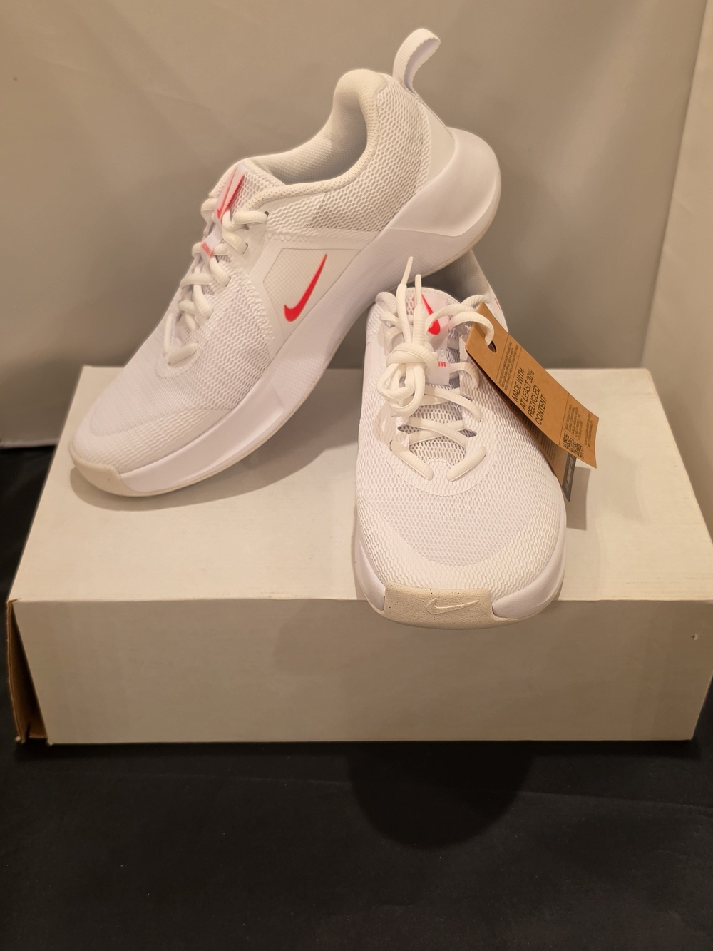 Nike Women's White Athletic Sneakers with Pink Swoosh